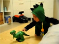 Baby scared by Dinosaur video
